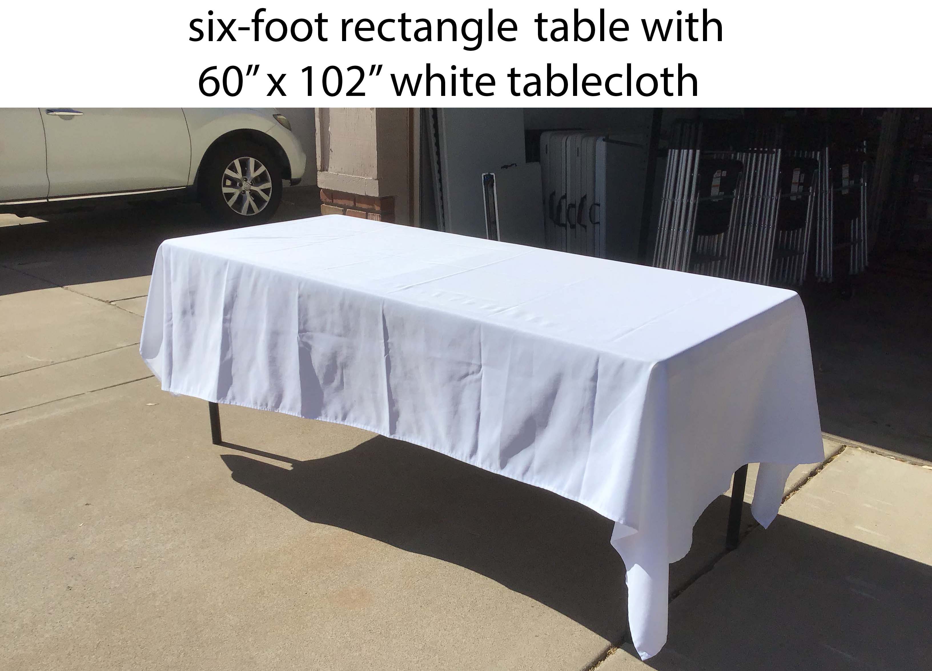 60 inch x 102 inch rectangle white tablecloth on a six-foot rectangle table