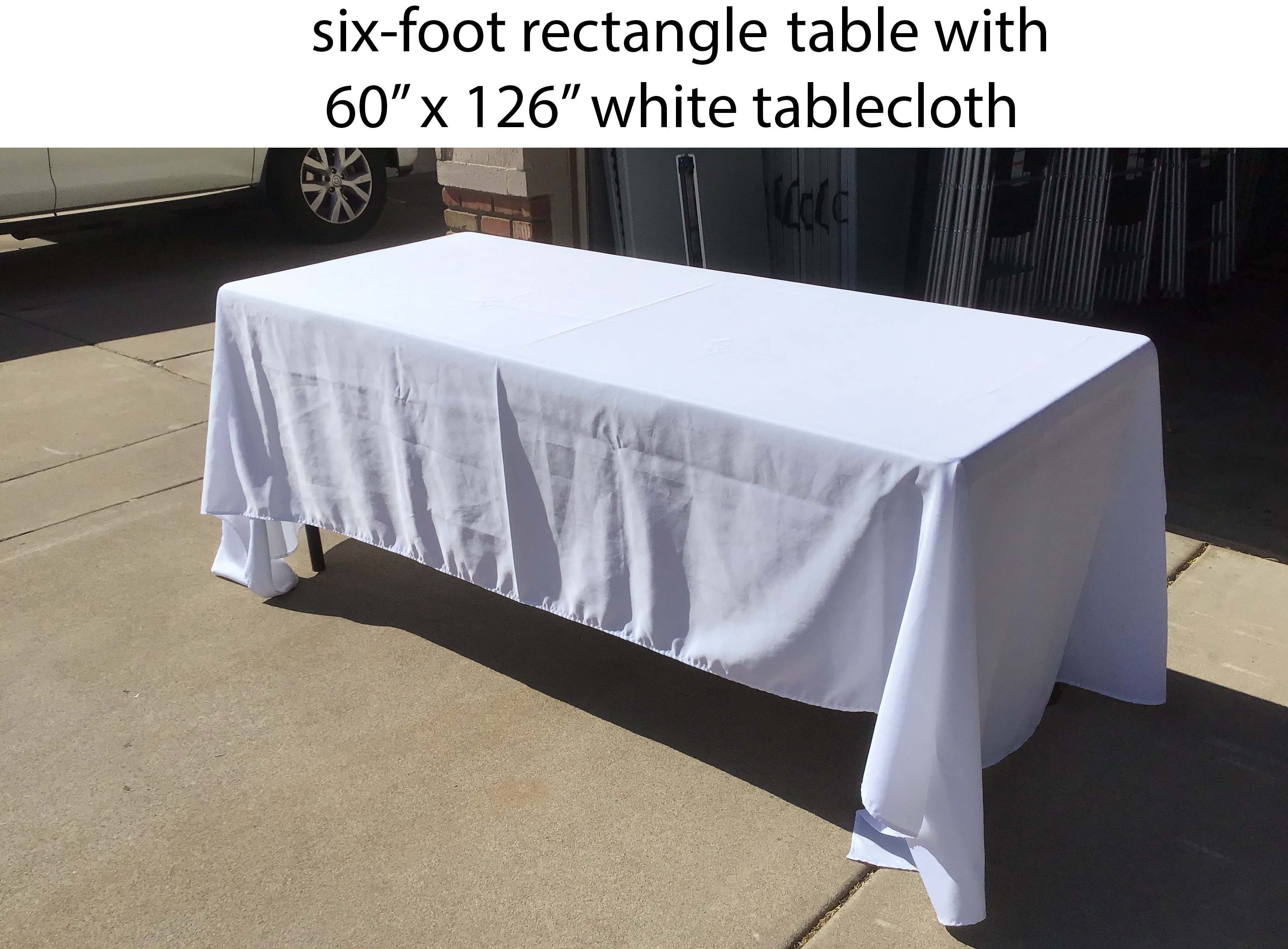 60 inch x 126 inch rectangle white tablecloth on a six-foot rectangle table