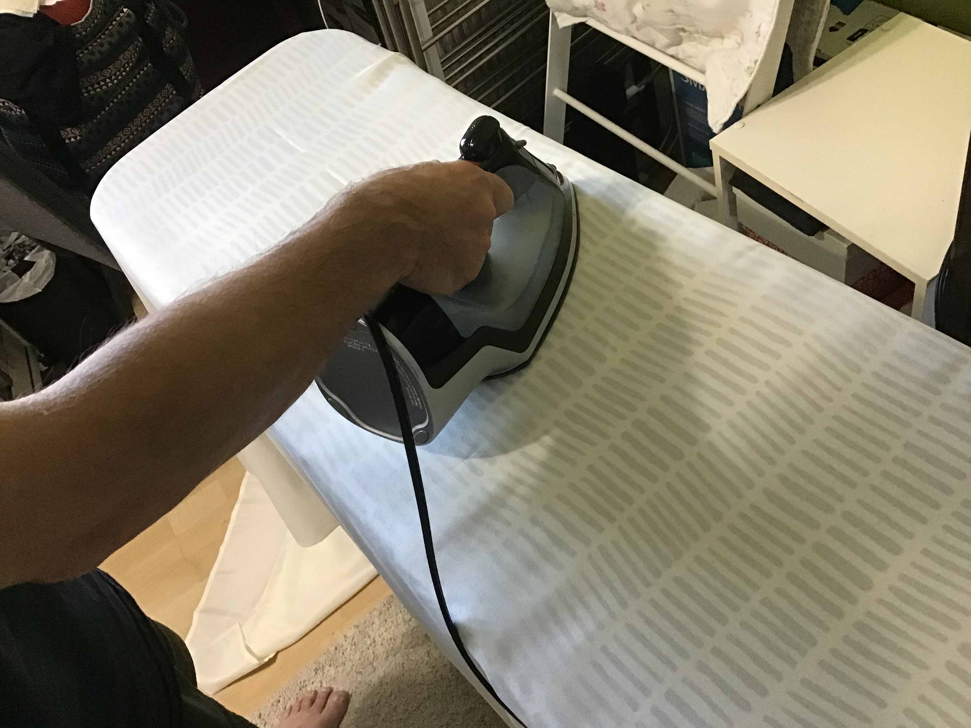 a wrinkled tablecloth, fresh out of its original being ironed by hand