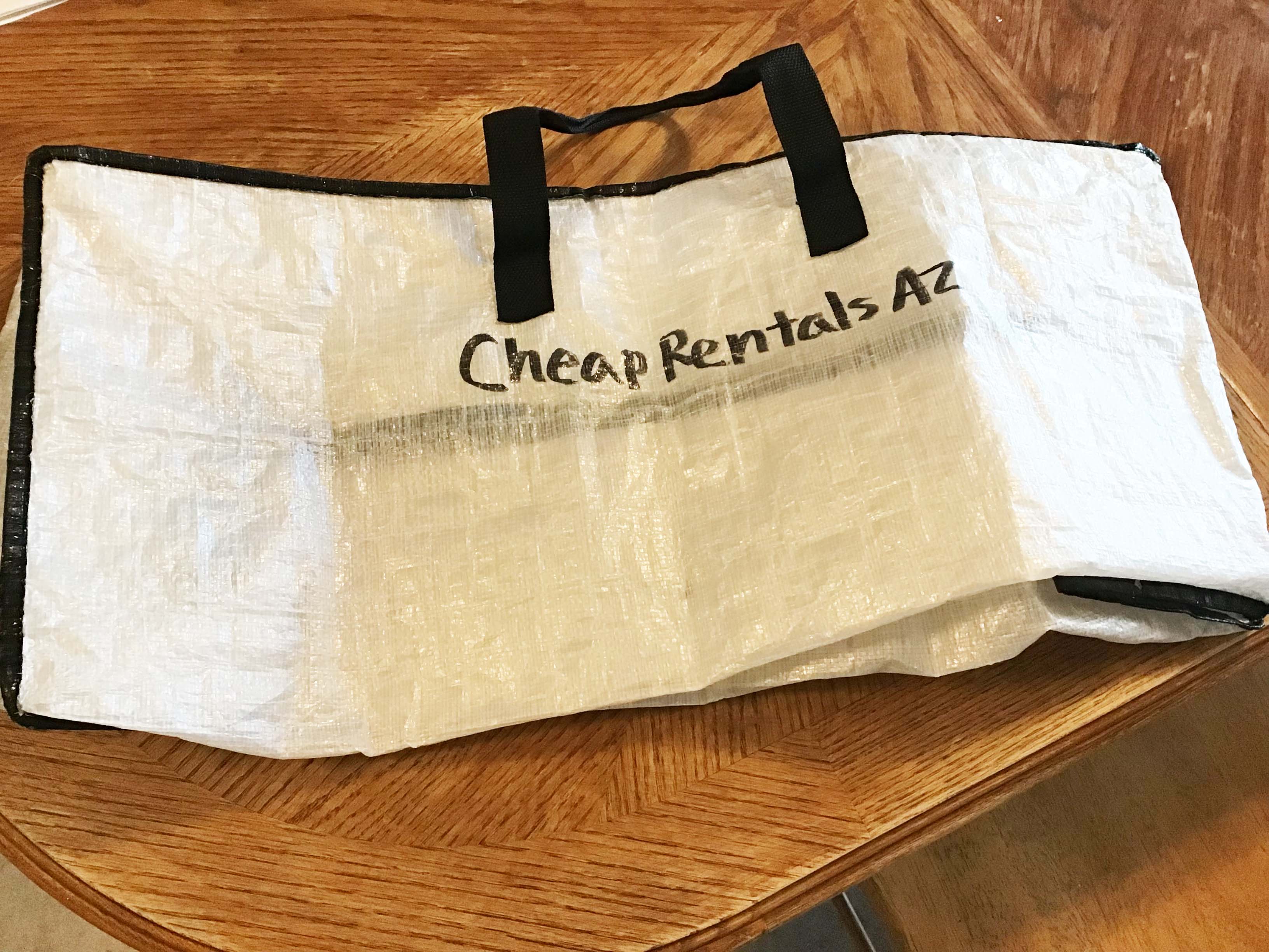 linen bag belonging to Cheap Rentals AZ