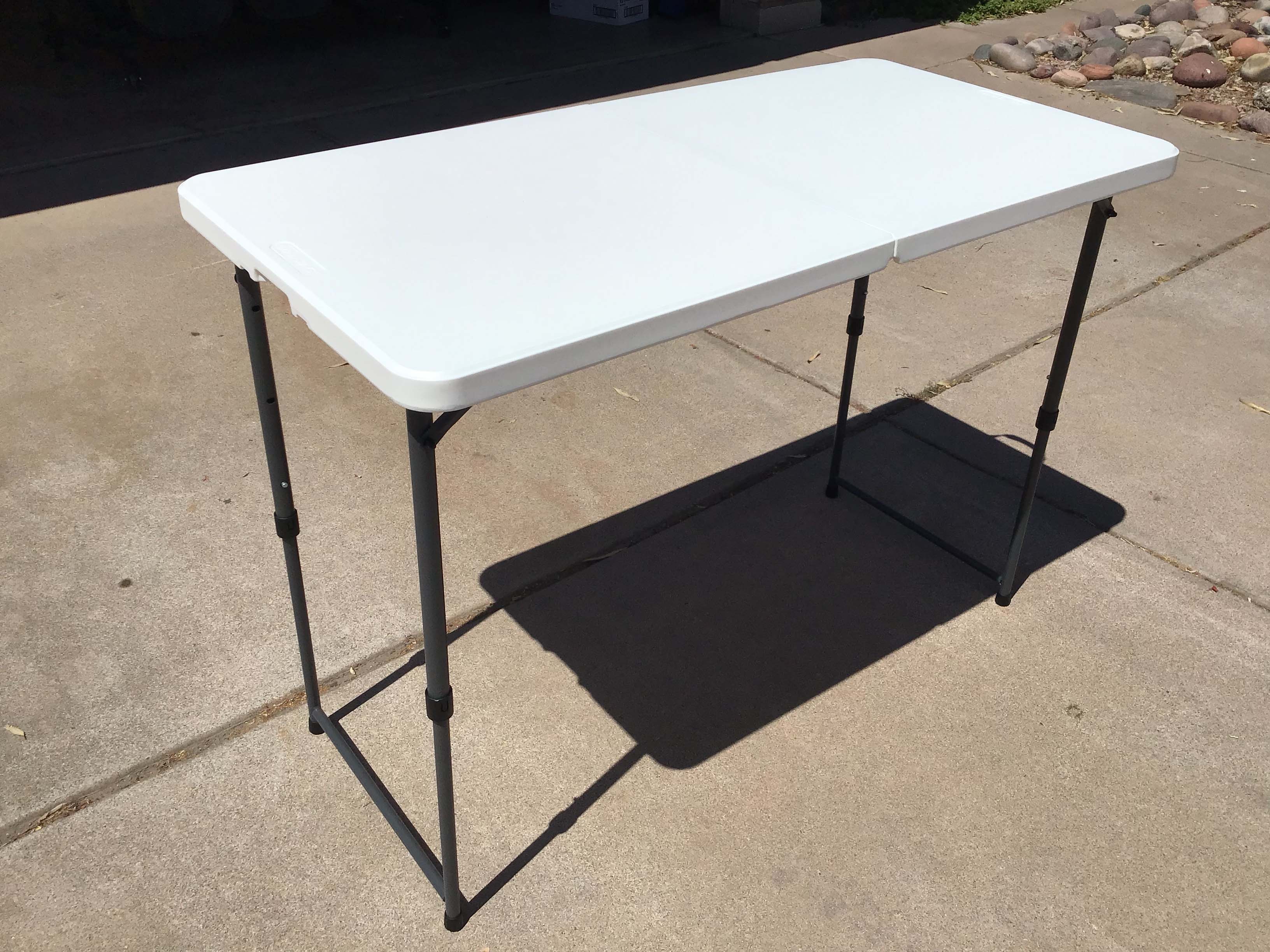 4 foot rectangle tables (adjustable heights)