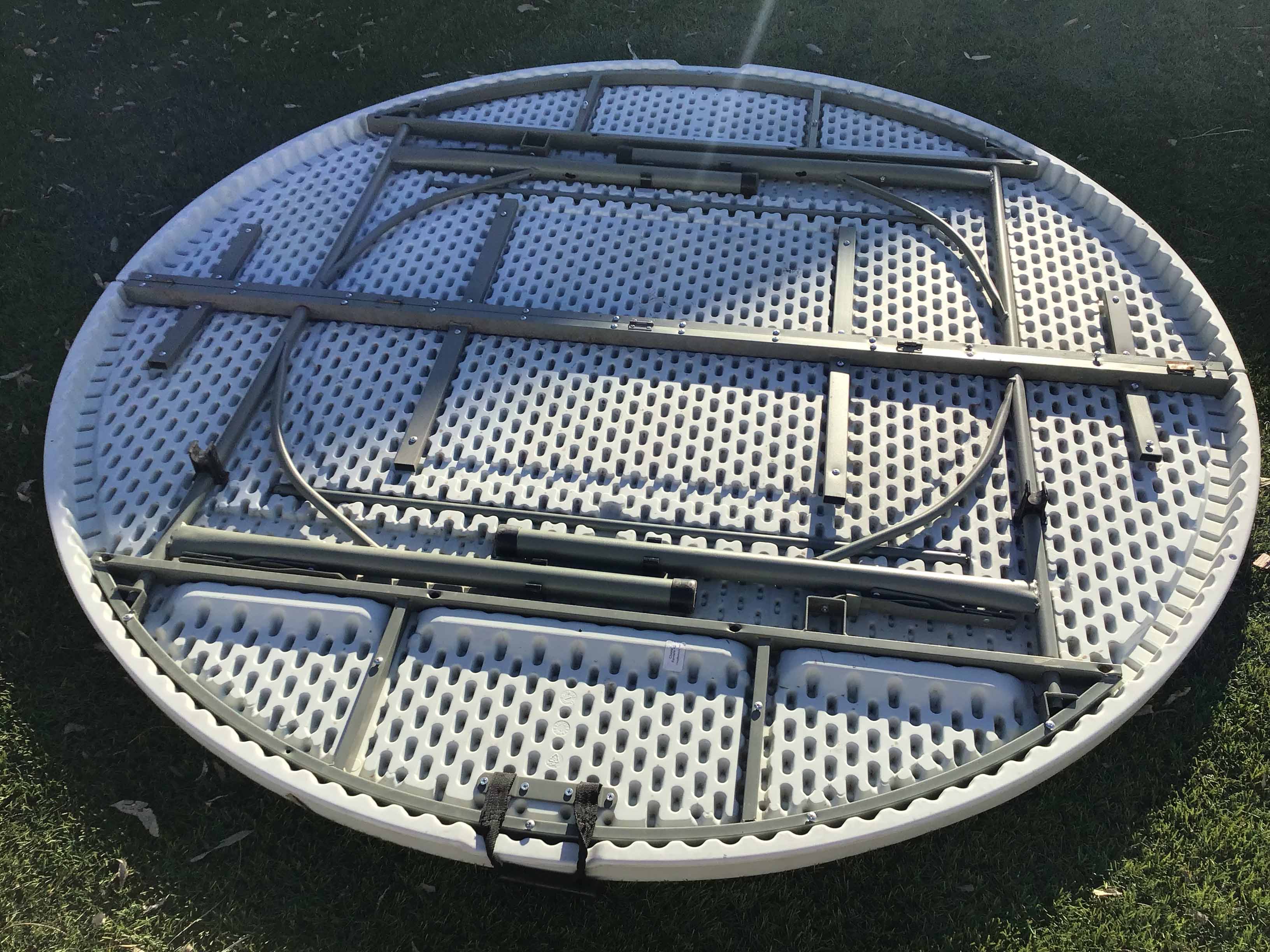 5 foot, 9 inch round tables (bifold)