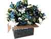 box of plastic silk flowers